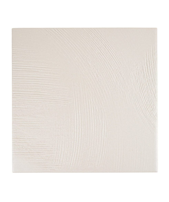 Matte white porcelain tile with subtle plaster-like textured surface, 7x7 inch square