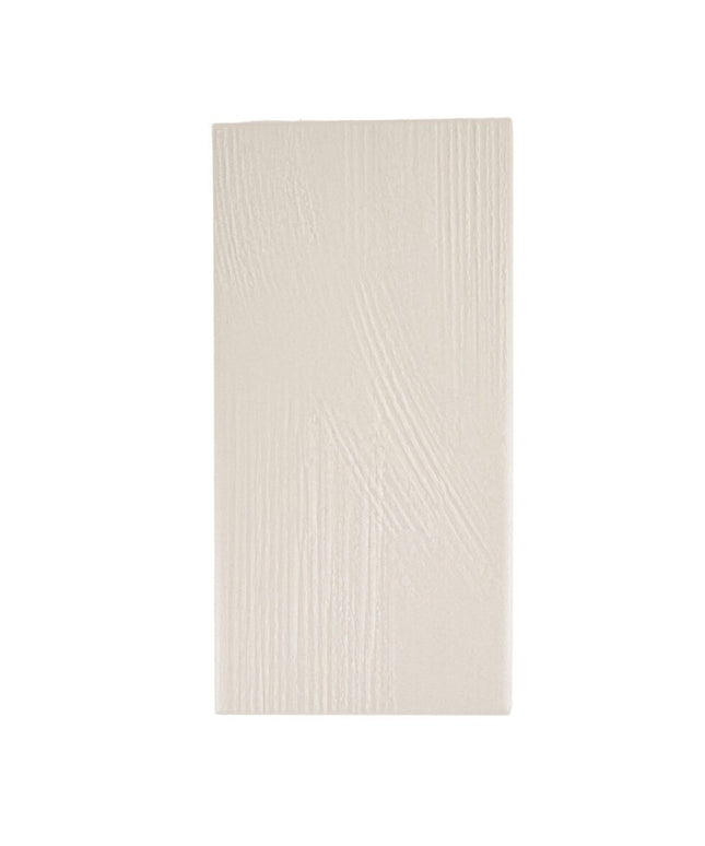 Textured rectangular porcelain tile in light beige with subtle plaster pattern, 3x7 inch