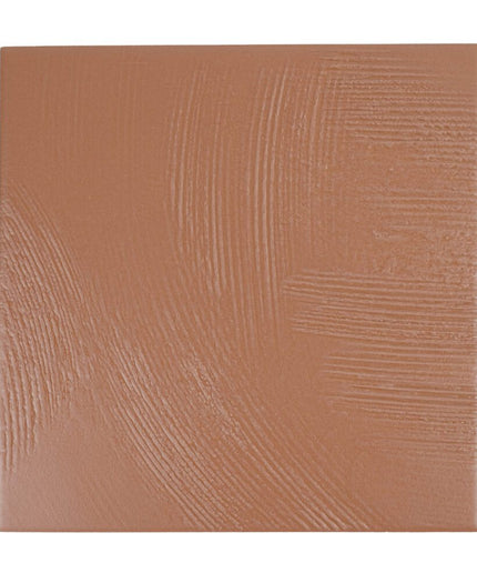 Matte terra cotta porcelain tile with subtle textured brushstroke pattern, 7x7 inch