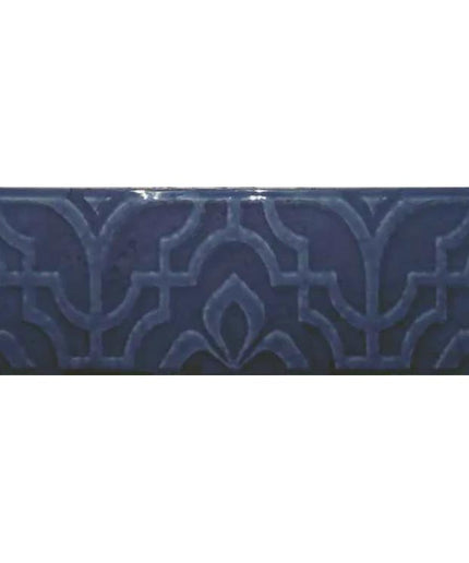 Glossy navy blue deco tile with raised geometric pattern, ideal for backsplash or bathroom
