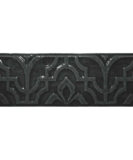 Charcoal gray decorative tile with raised geometric and floral pattern, ideal for backsplash or accent walls