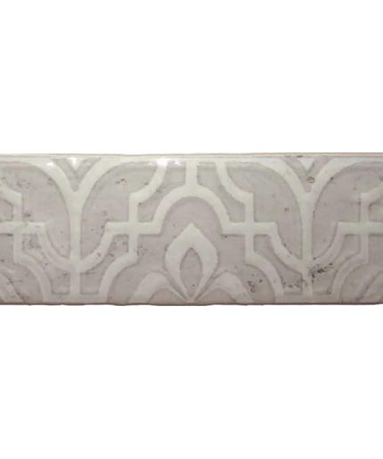 Silver grey decorative tile with embossed geometric pattern, suitable for backsplash or bathroom