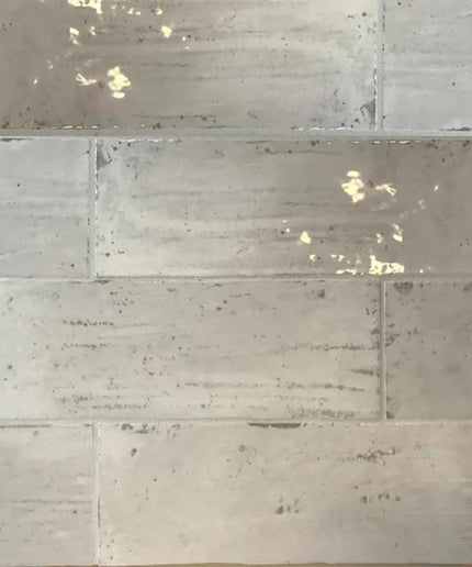 silver grey rectangular ceramic tiles with subtle textured finish, ideal for backsplash or bathroom walls