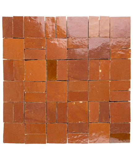 Sundried clay zellige tiles in a crosshatch pattern with a glossy finish