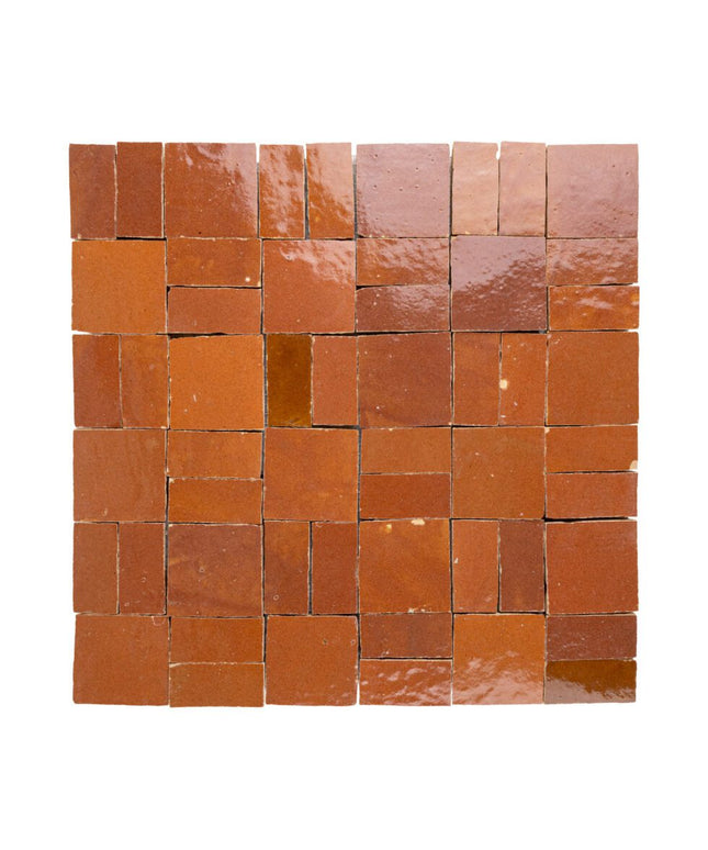 Sundried clay zellige tiles in a crosshatch pattern with a glossy finish