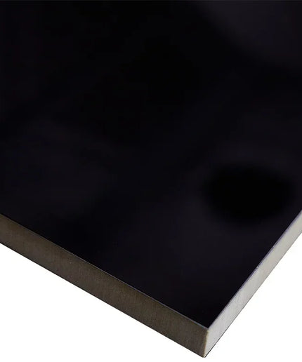 Black sheet of material on a white background