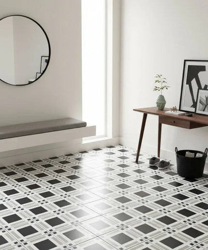 Modern entryway with black and white tartan patterned floor tiles, minimalist decor