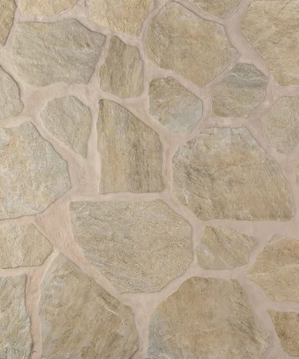 Close-up of a stone wall with irregularly shaped stones.