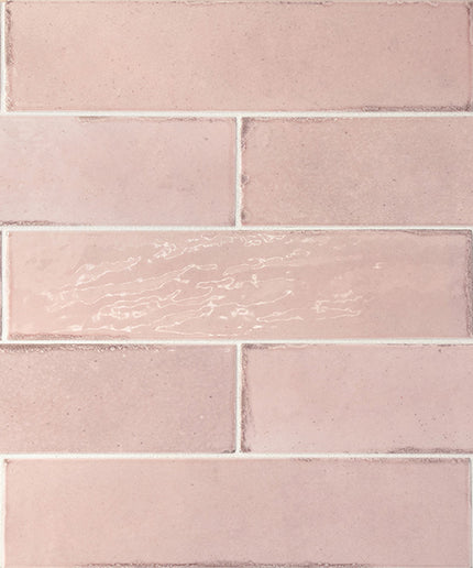 Close-up of pink tiles with a subtle pattern