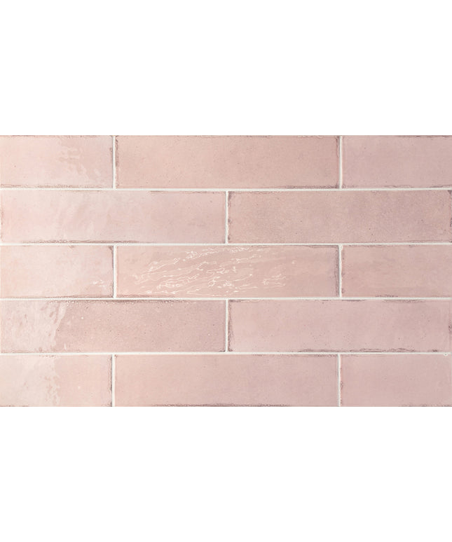 Close-up of pink tiles with a subtle pattern
