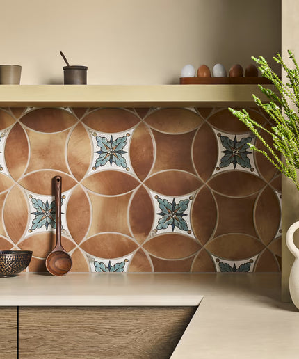 Kitchen counter with decorative tiles and kitchen items