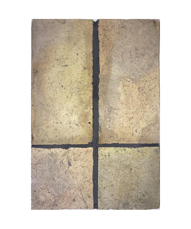 Rustic yellow terracotta tiles with textured surface and dark grout for floor or wall use