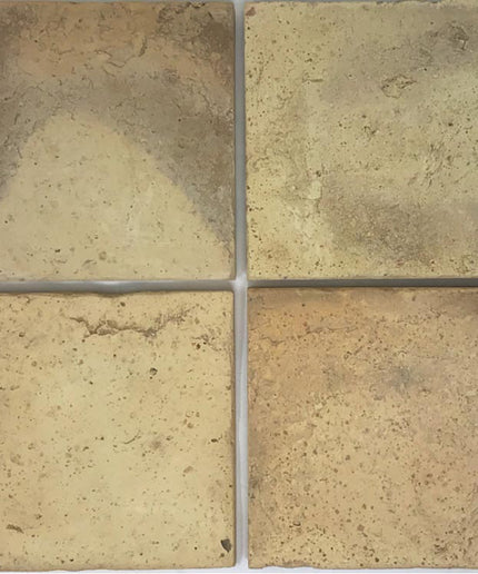 Rustic terracotta yellow 6x6 floor tiles with natural textured finish, ideal for kitchens or bathrooms.
