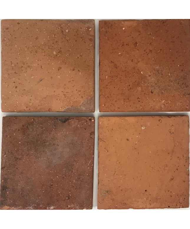 Four rustic terracotta 6x6 floor tiles with natural color variation and textured finish.