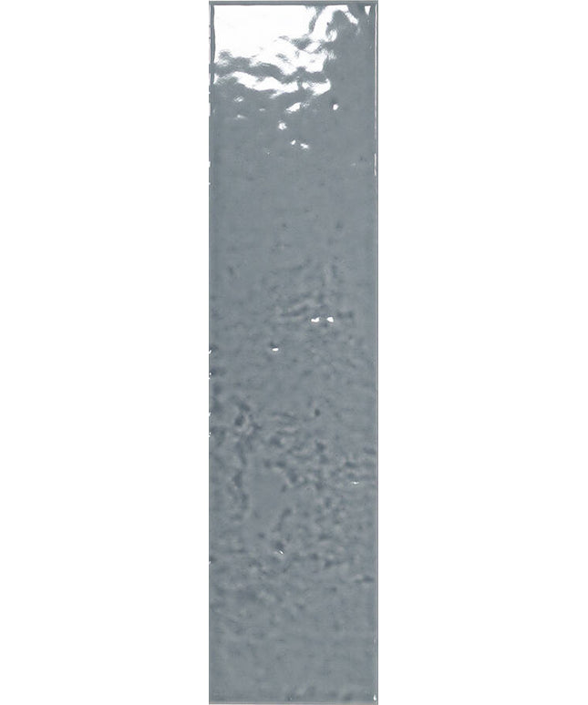 A close-up of a gray textured surface with a slightly reflective, mottled finish.