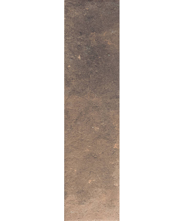 A square sample tile of textured brown material, showing a mottled earthy surface with variations in tone from dark brown to warm tan.