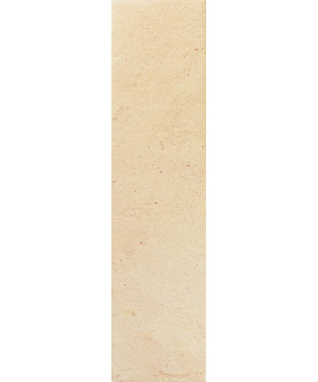 A close-up of a light beige stone or tile surface with subtle natural marbling and texture.