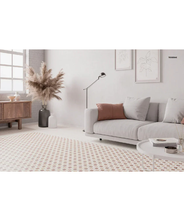 Modern living room with a gray sofa, wooden cabinet, and decorative elements.