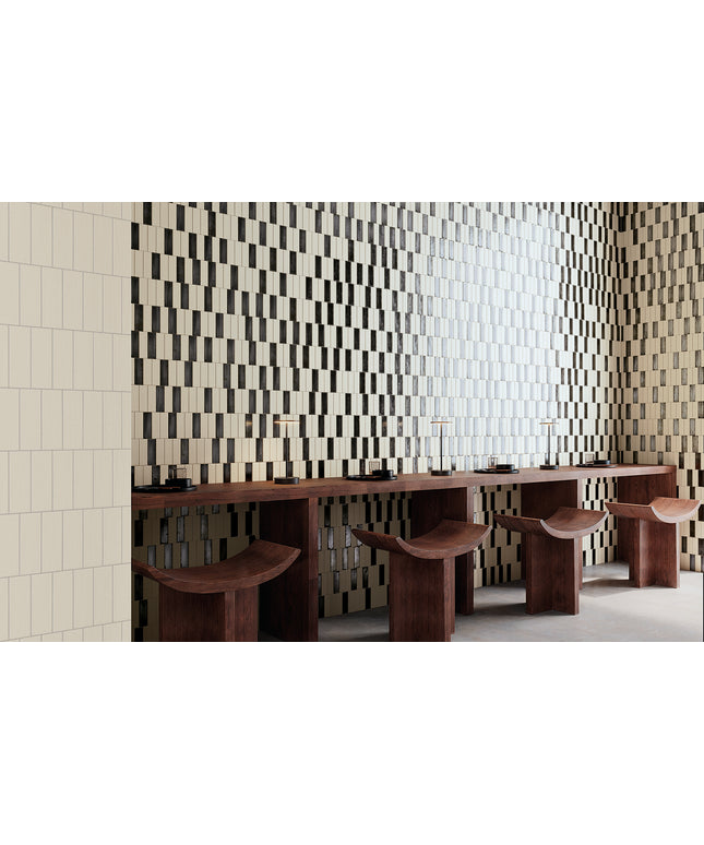 Modern interior with a patterned wall and wooden furniture.