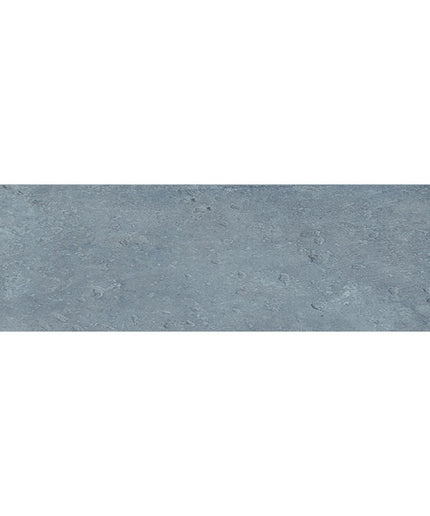 Blue rectangular floor and wall tile with a textured stone-look finish