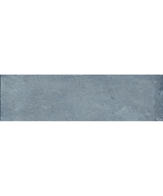 Blue rectangular floor and wall tile with a textured stone-look finish
