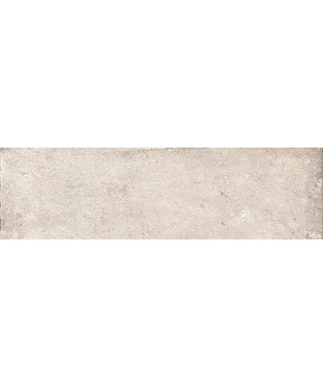 Rectangular cream ceramic tile with a textured stone finish, ideal for backsplash or flooring