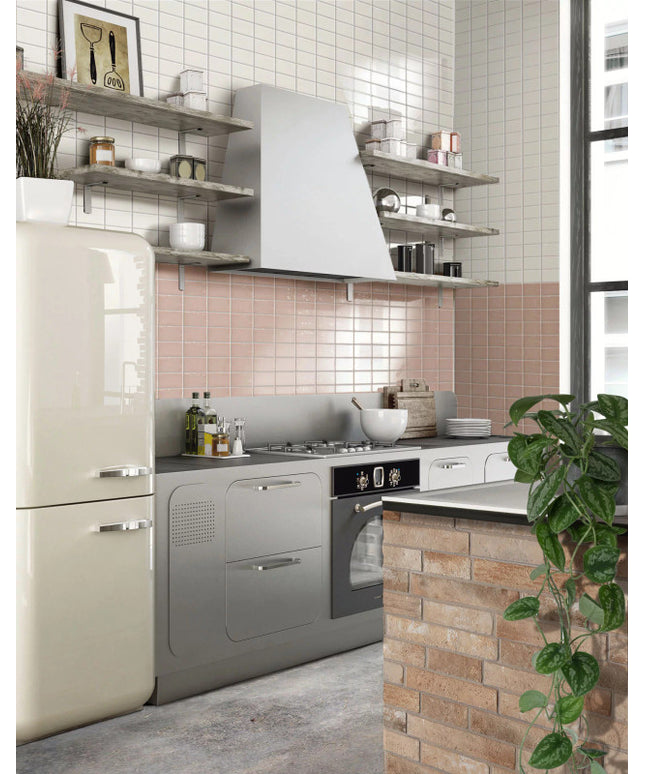 Modern kitchen with light pink backsplash tiles and white square wall tiles