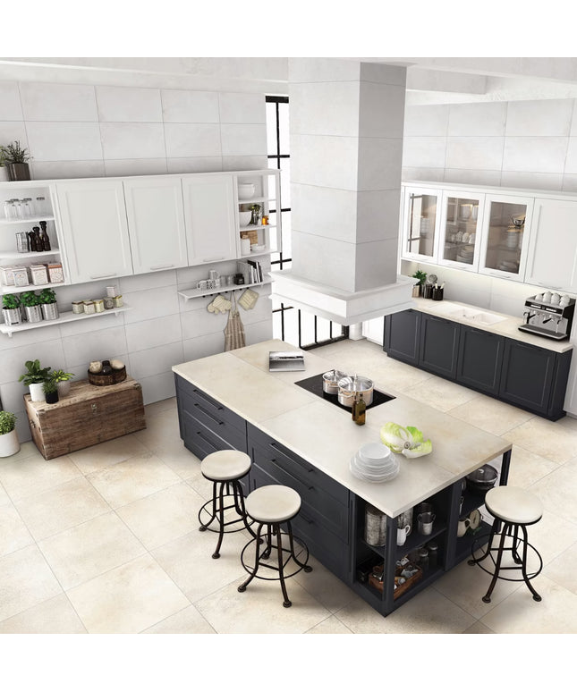 Modern kitchen with a central island, stools, and white tiled walls.