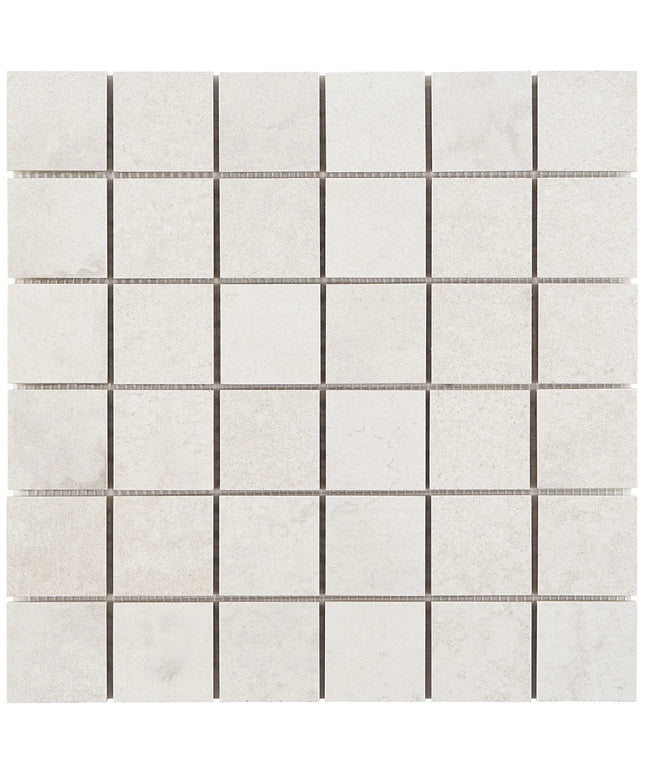 Mosaic tile pattern with small square tiles and thin grout lines on a white background made in the USA