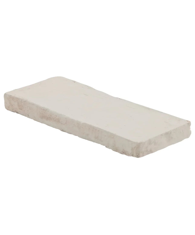 Rectangular foam mattress topper on a white background
