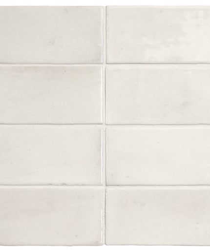 White ceramic tiles arranged in a grid pattern on a white background
