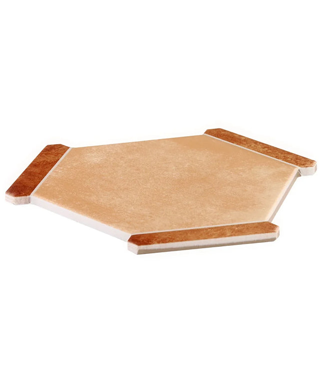 Hexagonal wooden cutting board with a white base on a white background